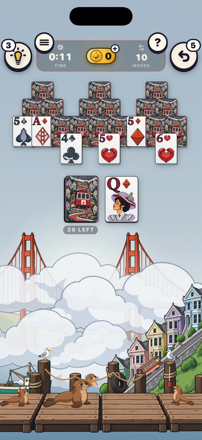 A game of TriPeaks on the San Francisco table: the red bridge in the fog, painted houses and sea lions on the pier.